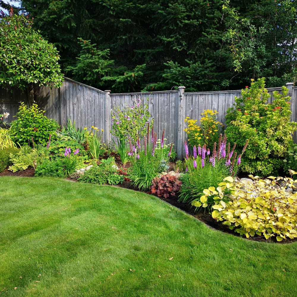 Professional lawn care team working